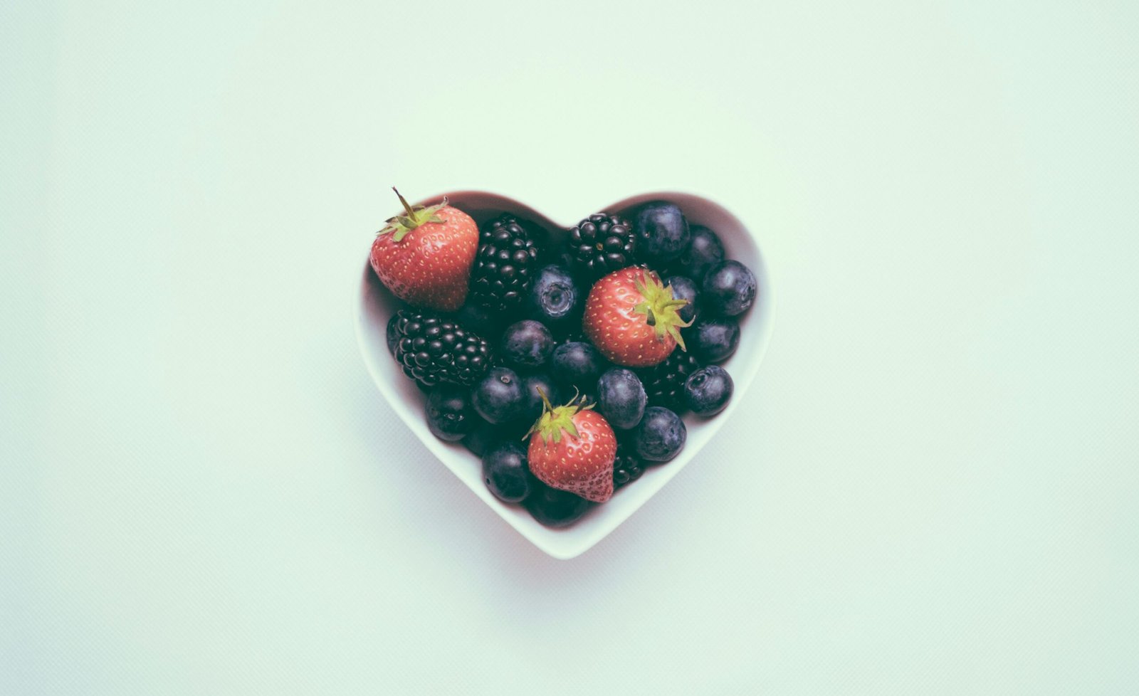 heart-shaped bowl with strawberries heart-shaped bowl with strawberries
